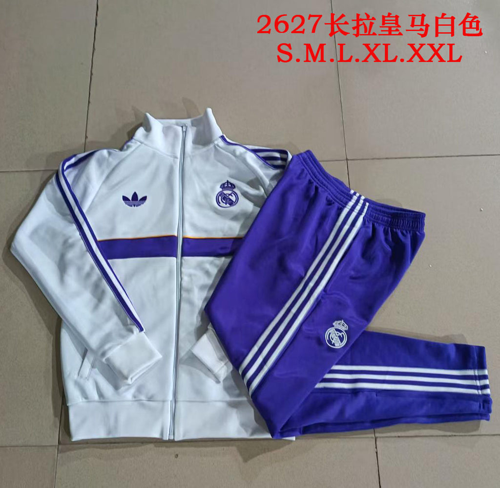 Real Madrid 2026/27 — Conjunto de treino branco e roxo com zíper completo