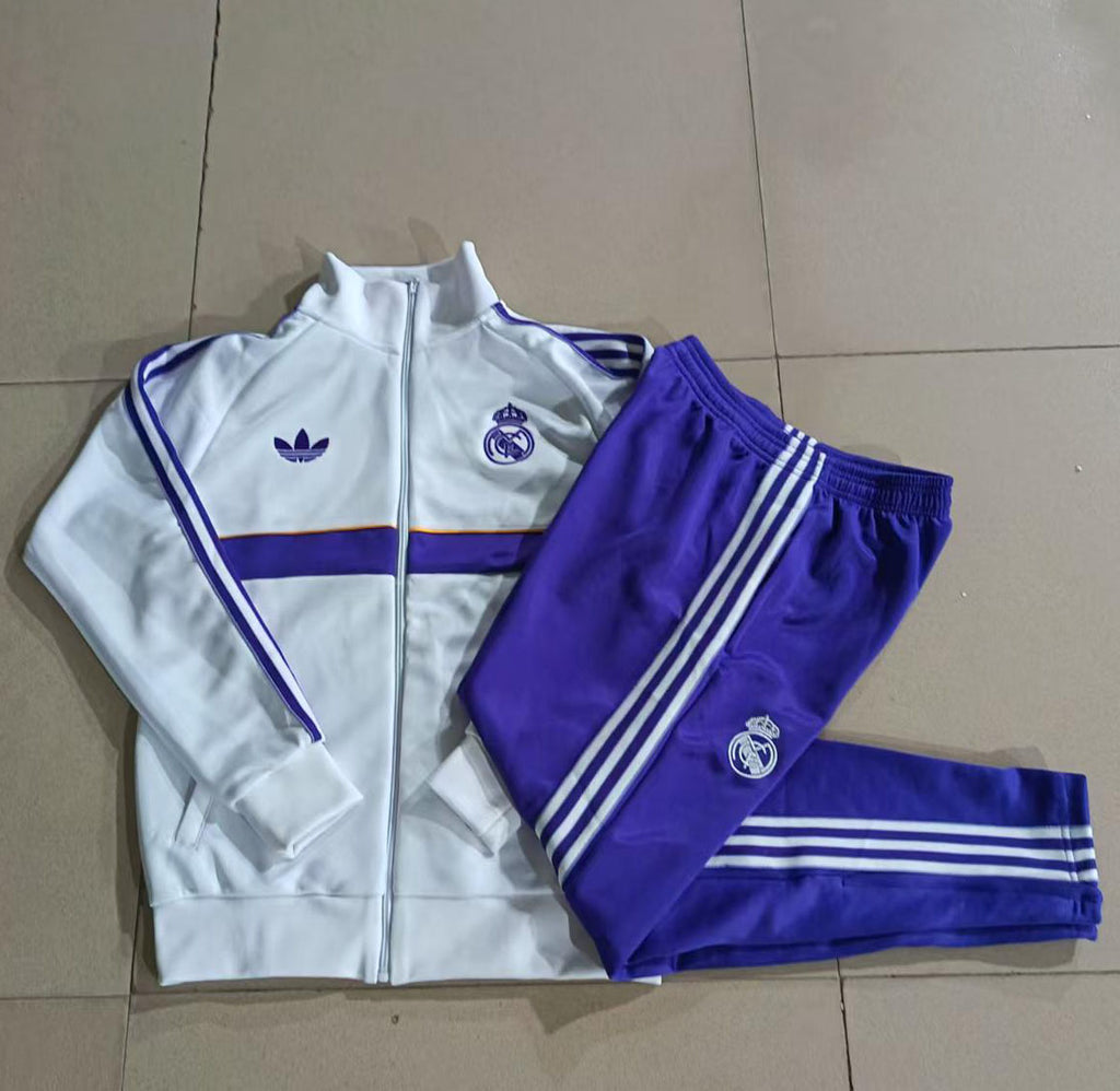 Real Madrid 2026/27 — Conjunto de treino branco e roxo com zíper completo